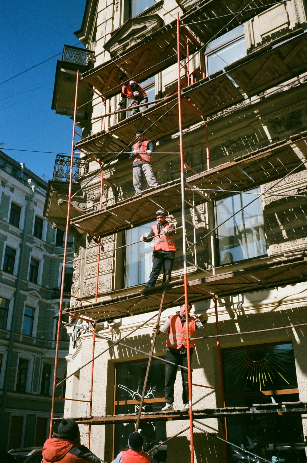 Construction site with scaffolding and crane